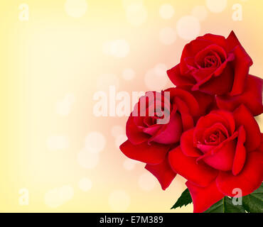 Trois roses rouges sont sur fond jaune Banque D'Images