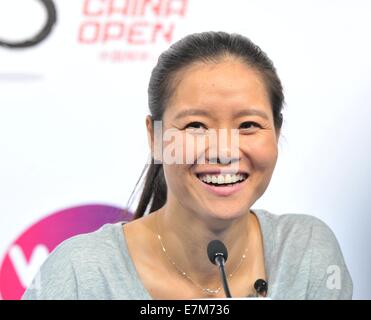 Beijing, Chine. Sep 21, 2014. Célèbre joueur de tennis chinoise Li Na réagit au cours de sa retraite, conférence de presse à Beijing, capitale de la Chine, 21 septembre 2014. La première et la seule gagnante du Grand Chelem Li Na a officiellement annoncé sa retraite le 19 septembre, laissant le tennis chinois aspiration à la prochaine superstar. © Li Wen/Xinhua/Alamy Live News Banque D'Images