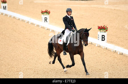 Incheon, Corée du Sud. Sep 24, 2014. Hua Tian de la concurrence de la Chine au cours de l'eventing dressage individuel match de sports équestres à la 17e Jeux asiatiques à Incheon, Corée du Sud, le 24 septembre 2014. Credit : Bai Xuefei/Xinhua/Alamy Live News Banque D'Images