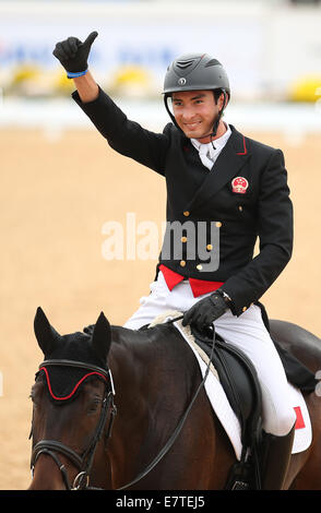 Incheon, Corée du Sud. Sep 24, 2014. Hua Tian de la concurrence de la Chine au cours de l'eventing dressage individuel match de sports équestres à la 17e Jeux asiatiques à Incheon, Corée du Sud, le 24 septembre 2014. Credit : Bai Xuefei/Xinhua/Alamy Live News Banque D'Images