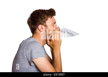 Close up portrait of man blowing nose Banque D'Images