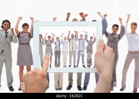 Image composite de hand holding tablet pc Banque D'Images