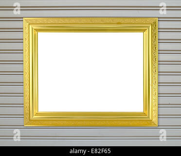 Cadre doré vierge sur metal wall background Banque D'Images