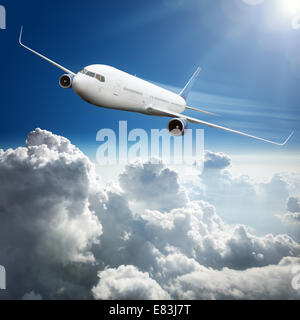 Avion au-dessus des nuages Banque D'Images