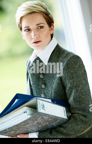 Femme a souligné in office Banque D'Images