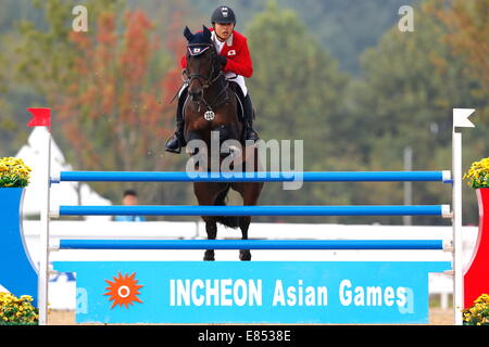 Incheon, Corée du Sud. Sep 30, 2014. Tadahiro Hayashi (JPN) Equitation : Jumping Final individuel à Dream Park Sports équestres au cours de la 2014 Jeux Asiatiques d'Incheon en Corée du Sud, la Corée du Sud. © AFLO SPORT/Alamy Live News Banque D'Images