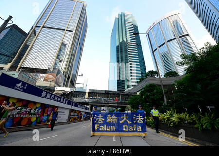 Hong Kong. 1er octobre 2014. procession dans Wan Chai & Amirauté,des slogans contre le Parti communiste pour divers crimes y compris la liberté de parole. Credit : Boaz Rottem/Alamy Live News Banque D'Images