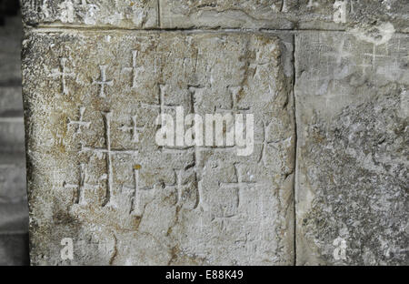 Israël. Jérusalem. Graffiti croisé sur les murs. Église du Saint-Sépulcre. Banque D'Images