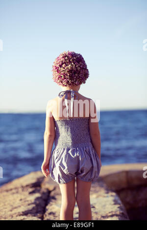 Girl in swimcap à à la plage