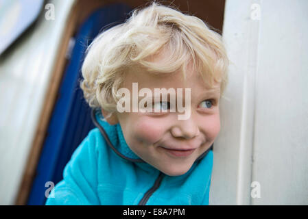 Close up portrait of young blonde Cheeky Boy Banque D'Images