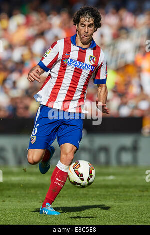 Valence, Espagne. 08Th Oct, 2014. La Liga. Valencia CF Athletico Madrid contre. Le milieu de terrain Tiago Cardoso de l'Atletico Madrid en action : Action Crédit Plus Sport/Alamy Live News Banque D'Images