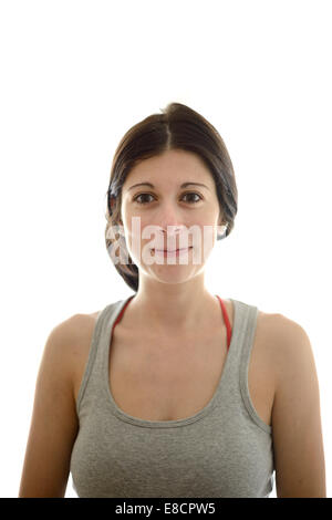 Portrait of young woman in tank top looking at camera Banque D'Images