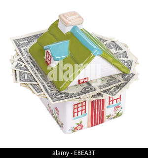 L'argent en forme de maison fort farci de paiement Banque D'Images