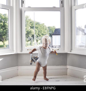 Boy in holding toy Banque D'Images