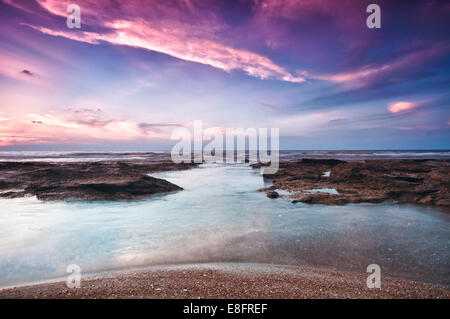 Israël, Tel Aviv, Tel Aviv, Coucher du soleil sur la plage Banque D'Images