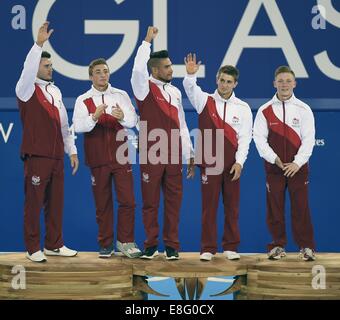 (L à r) Kristian Thomas, Sam Oldham, Louis Smith, Max Whitlock et Nile Wilsone (FRA) avec leurs médailles d'or. Artistique de l'équipe de mens Banque D'Images