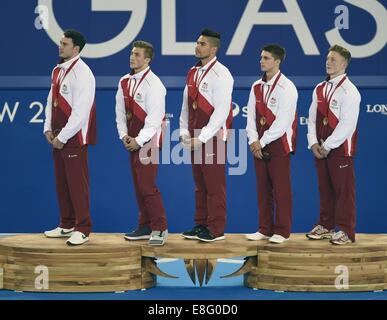 (L à r) Kristian Thomas, Sam Oldham, Louis Smith, Max Whitlock et Nile Wilsone (FRA) avec leurs médailles d'or. Artistique de l'équipe de mens Banque D'Images