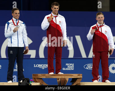 Max Whitlock (FRA) Médaille d'or, Daniel Keatings (SCO) Médaille d'argent, Nil Wilson (FRA) Médaille de Bronze. La gymnastique artistique masculine- Al Banque D'Images