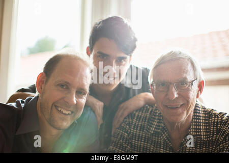 Portrait of three generation family smiling together at home Banque D'Images