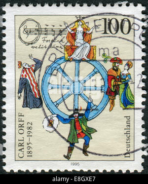 Allemagne - circa 1995 : timbre-poste imprimé en Allemagne, dédié à la 100e anniversaire du compositeur Carl Orff, circa 1995 Banque D'Images