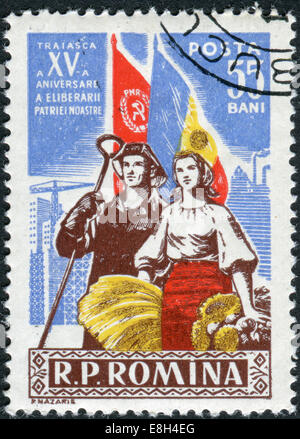 Timbre-poste imprimé en Roumanie, dédié au 15ème anniversaire de la libération de la Roumanie auprès des Allemands, travailleurs de l'acier montre Banque D'Images