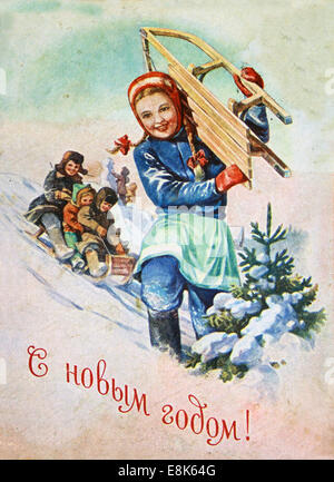 2 décembre 2009 - Reproduction de meubles anciens carte postale montre fille avec traîneau, vers 1953, l'URSS. .Texte russe : Bonne Année ! (Crédit Image : © Igor Golovniov/ZUMA/ZUMAPRESS.com) fil Banque D'Images