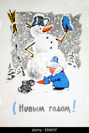 2 décembre 2009 - La reproduction de carte postale ancienne photo de l'artiste Zarubin, montre une fille à l'arrière-plan d'un bonhomme de l'alimentation d'un lapin une carotte, vers 1964, l'URSS..texte russe : Bonne Année ! (Crédit Image : © Igor Golovniov/ZUMA/ZUMAPRESS.com) fil Banque D'Images