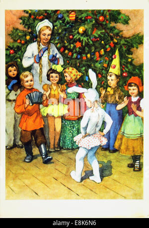 2 décembre 2009 - Reproduction de meubles anciens carte postale montre l'artiste Dessin Milashevsky montre fille en costume de lapin dansant dans l'arrière-plan de l'arbre de Noël, vers 1958, l'URSS. (Crédit Image : © Igor Golovniov/ZUMA/ZUMAPRESS.com) fil Banque D'Images