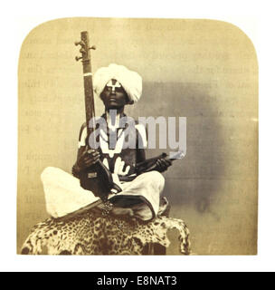 Cette illustration de 1862 tirée de l’œuvre de Weld représente un mendiant brahmane en Inde, capturant la dynamique culturelle et sociale de l’époque, en mettant l’accent sur la tenue vestimentaire traditionnelle et le mode de vie du mendiant. Banque D'Images