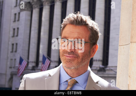 Caucasian businessman in city, New York City, New York, United States Banque D'Images