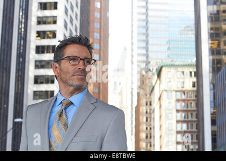 Caucasian businessman standing in city, New York City, New York, United States Banque D'Images