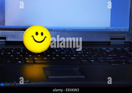 Smiley sur ordinateur portable Banque D'Images