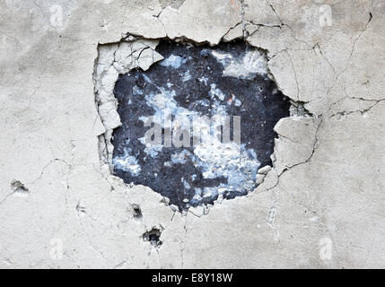 Trou dans le béton Banque D'Images