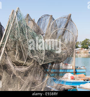 Les filets de pêche, la nasse et bateaux de pêche dans le lagon. Marano - Italie Banque D'Images