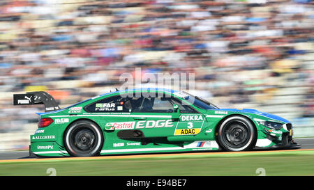 Hockenheim, Allemagne. 19 Oct, 2014. DTM brésilien Augusto Farfus pilote de l'équipe BMW lecteurs RBM dans son BMW M4 lors de la dernière course de la saison du Masters allemand de voitures de tourisme (DTM) à Hockenheim, Allemagne, 19 octobre 2014. Photo : Uwe Anspach/dpa/Alamy Live News Banque D'Images