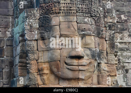 Face à face de la tour de Bodhisattva Lokeshvara, Avalokiteshvara, Bayon Temple du "grand capital" Angkor Thom, Angkor région Banque D'Images