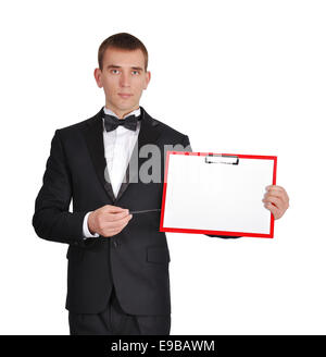 Man in tuxedo holding blank presse-papiers Banque D'Images