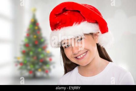 Image composite de petite fille fête smiling at camera Banque D'Images