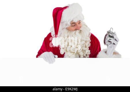 Happy santa avec réveil et signer Banque D'Images