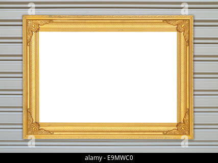 Cadre doré vierge sur metal wall background Banque D'Images