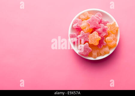 Jelly étoiles sur fond rose Banque D'Images