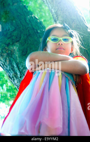 Portrait of young girl wearing fancy dress costume, low angle view Banque D'Images