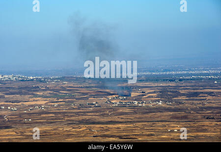 À partir de l'explosion de la guerre en Syrie peut être vu à partir d'une colline sur les hauteurs du Golan 150 mètre de la frontière, à environ 10 kilomètres de sou Banque D'Images