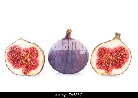 Figues entières de fruits et deux moitiés Banque D'Images