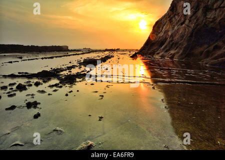 L'Indonésie, Sawarna, Tanjung Layar, Scenic view of landscape at sunset Banque D'Images