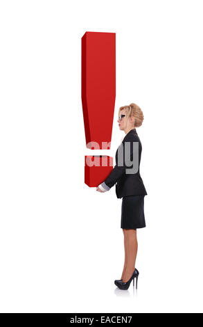 Young businesswoman holding big d'exclamation Banque D'Images