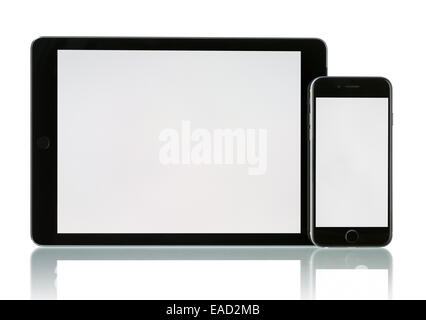 Espace Apple iPhone 6 Gris et 2 iPad Air avec Wi-Fi  + Cellular écran vide. Banque D'Images