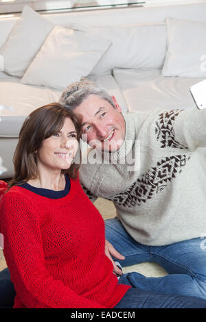 Couple taking a photo Banque D'Images