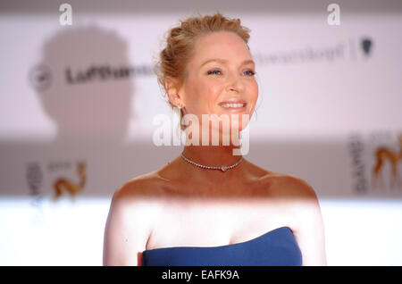 Berlin, Allemagne. 13Th Nov, 2014. L'actrice Uma Thurman nous arrive sur le tapis rouge pour la cérémonie de remise des prix Bambi au stade Théâtre sur la Potsdamer Platz à Berlin, Allemagne, 13 novembre 2014. Thurman a été décerné dans la catégorie 'Film International'. La soirée de gala pour le 66ème Bambi Prix organisé par Hubert Burda Media a eu lieu le 13 novembre 2014. Photo : Britta Pedersen/dpa/Alamy Live News Banque D'Images