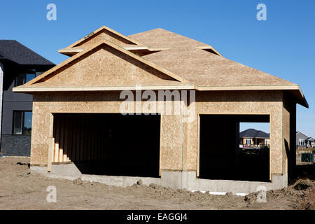 Maison typique en bois avec panneaux de construction fiche Saskatchewan Canada Banque D'Images